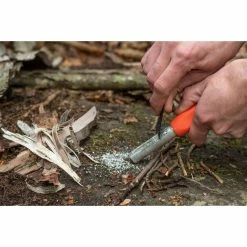 Adventure Medical Kits SOL Mag Striker With Tinder Cord 8 Adventure Medical Kits SOL Mag Striker With Tinder Cord -NRS shop 0140 1241 sol mag striker close up scraping magnesium off rsz 70105.1626823516