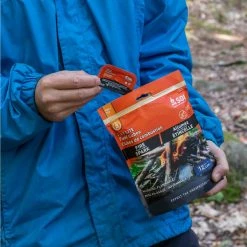 Adventure Medical Kits SOL Fire Lite Fuel Cubes (Spring 2022) -NRS shop 0140 1246 fuelcubes pullingoutofpackage rsz 12134.1626823504